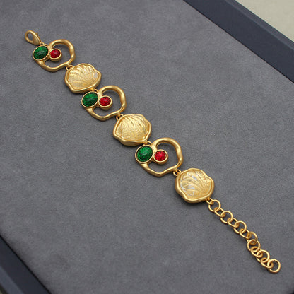 Handcrafted Jelly Glass-Look Gold-Plated Bracelet and Stud Earrings Set - Embossed Floral Design with Red & Green Gemstone Accents, Elegant Accessory for Day to Evening Glamour