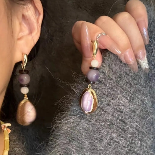 Handcrafted earrings made with natural conch shells and adorned with purple jade beads, S925silver,elegant and refined design,a perfect gift